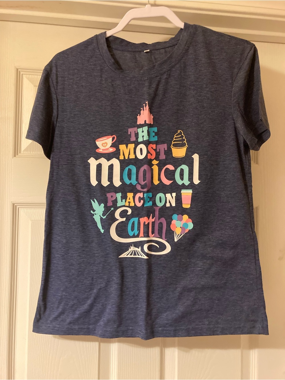⭐️⭐️ Women's Navy 'The Most Magical Place on Earth' Graphic Tee